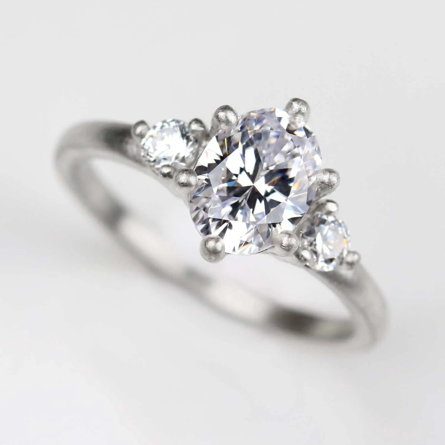 8x6mm Prong-set Oval Three Stone Ring 