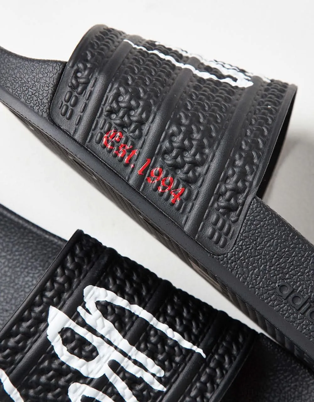 adidas x Korn Adilette Slides - Core Black/White/Better Scarlet