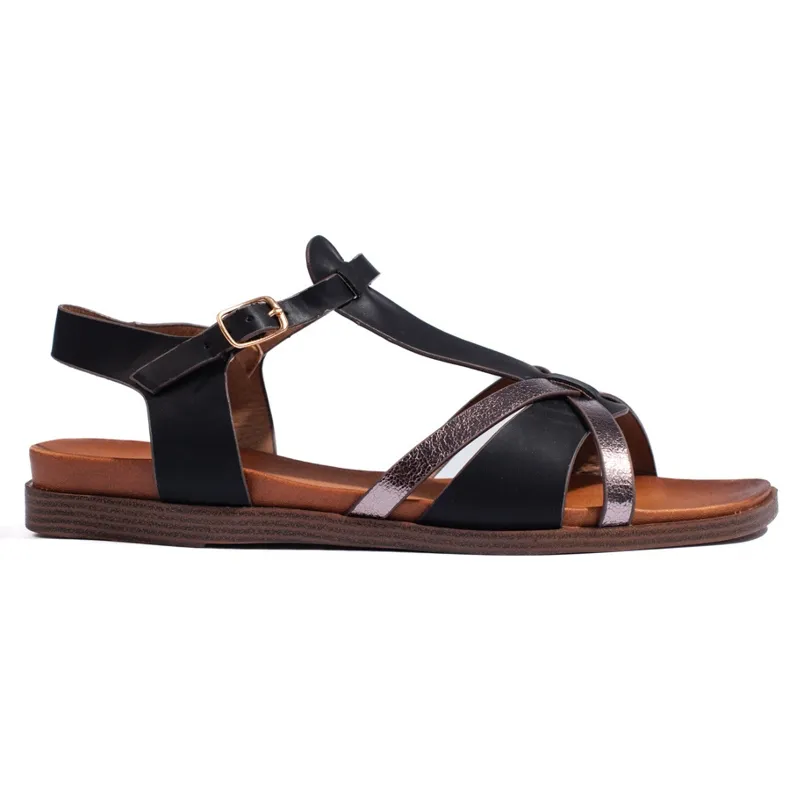 Black flat sandals by Sergio Leone