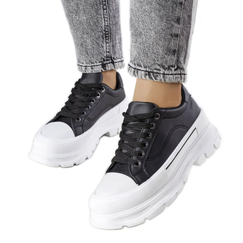 Black high platform sneakers from Kari