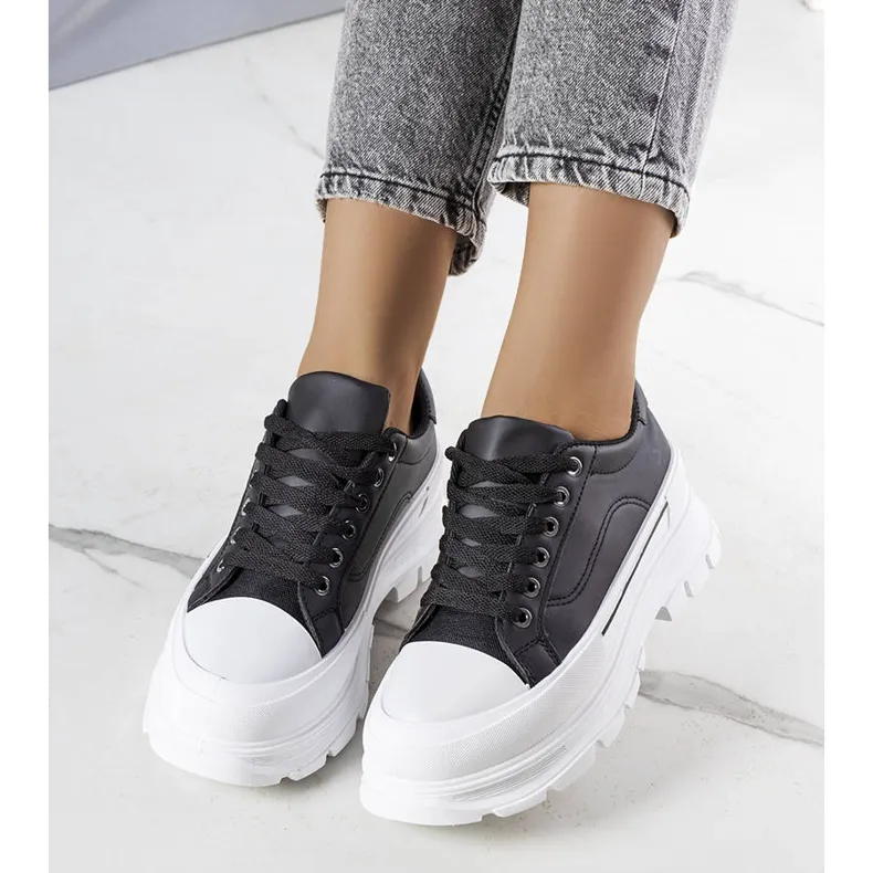 Black high platform sneakers from Kari