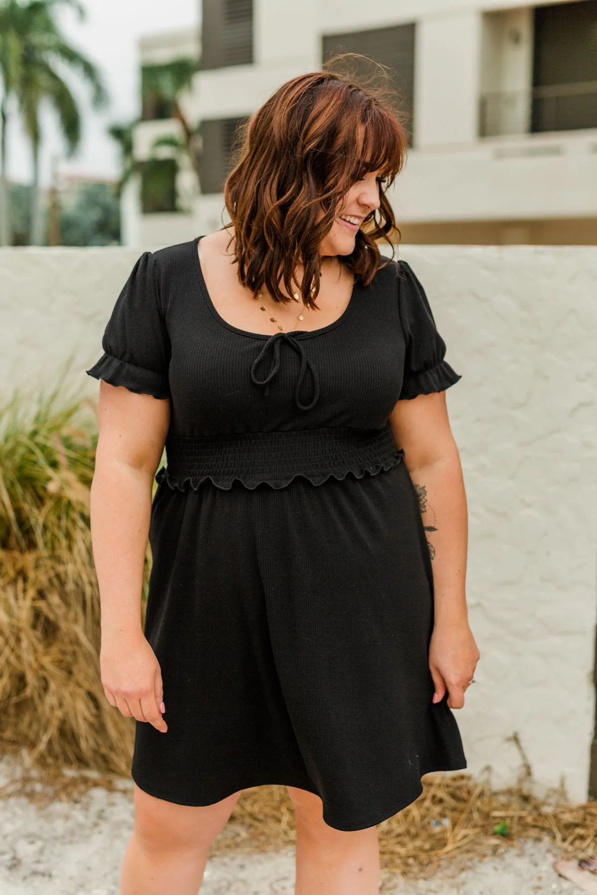 Black Smocked Knit Dress with Sincere Smiles