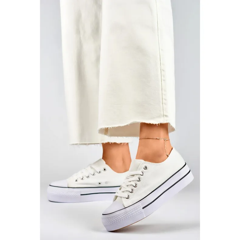 White sneakers with a thick sole, classic white women's sneakers