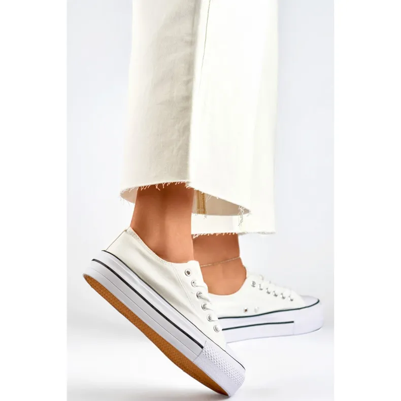 White sneakers with a thick sole, classic white women's sneakers